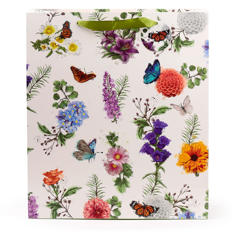 Gift bag with floral and butterfly design on a white background