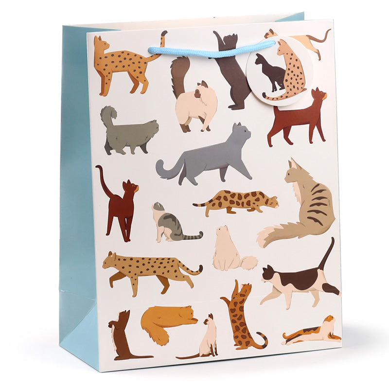 Gift bag with cat illustrations on a white background