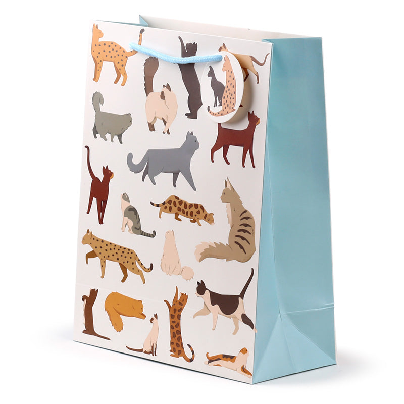 Gift bag with cat illustrations on a white background