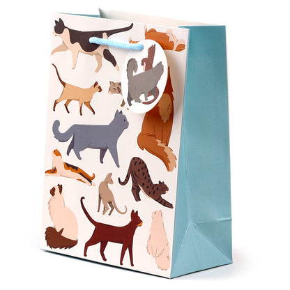 Gift bag with cat illustrations on a white background
