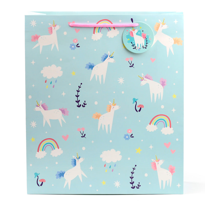 Unicorn-themed stationery set on a light blue background