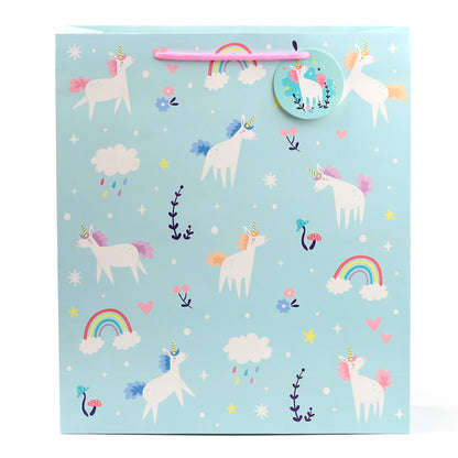 Unicorn-themed stationery set on a light blue background