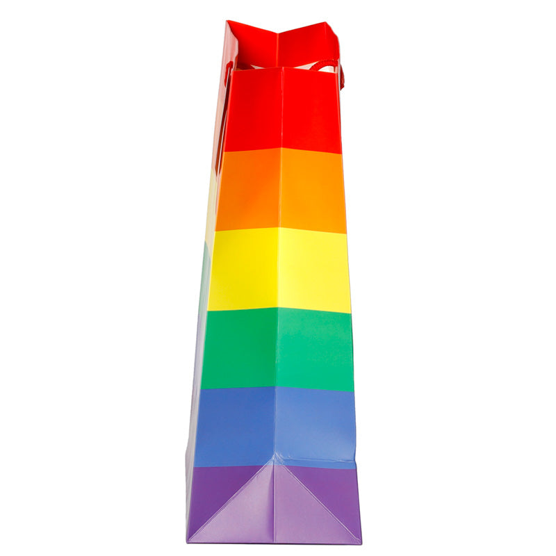 Colorful paper bag with rainbow pattern on a white background