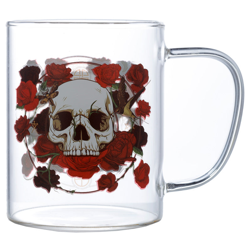 Clear glass mug with a skull and red roses design on a white background