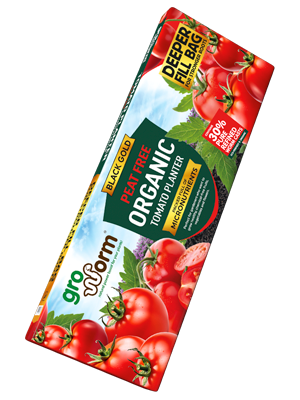 Black Gold Organic Tomato Fertilizer package with tomatoes on a white background