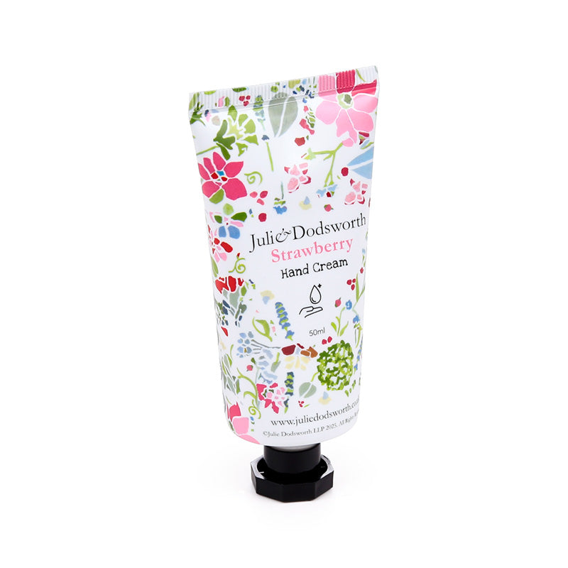 Hand cream tube with floral design and 'Julie Dodsworth' branding on a white background