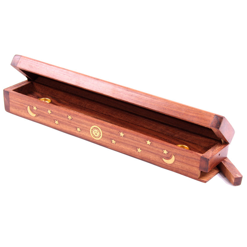 Wooden incense holder with decorative engravings on a white background