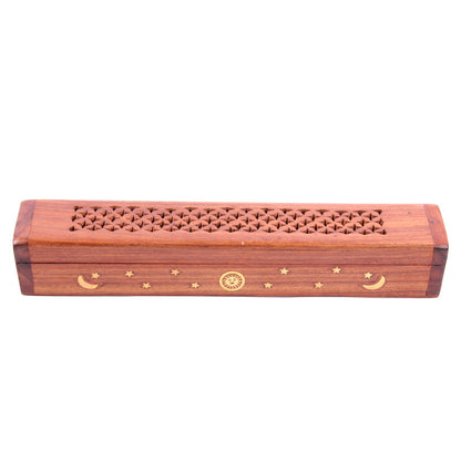 Wooden incense holder with decorative patterns on a white background