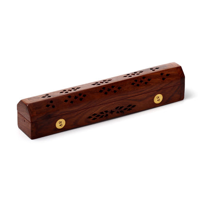 Wooden incense holder with gold accents on a white background