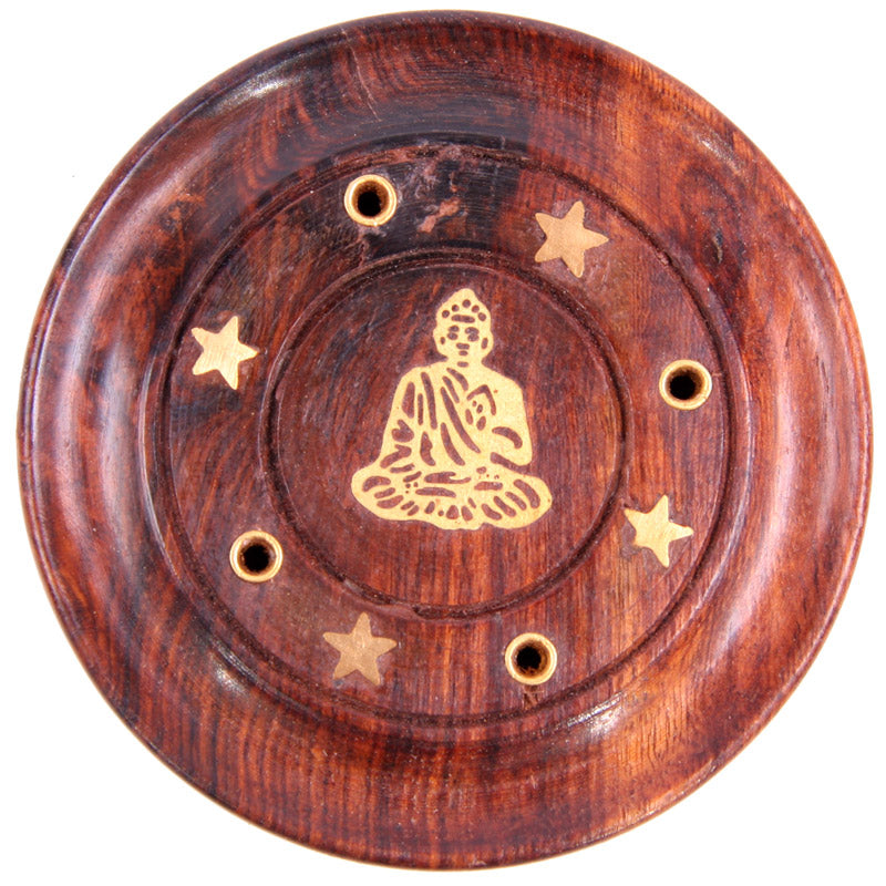 Wooden plate with Buddha illustration and star patterns on a white background