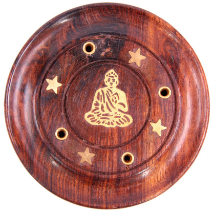 Wooden plate with Buddha illustration and star patterns on a white background