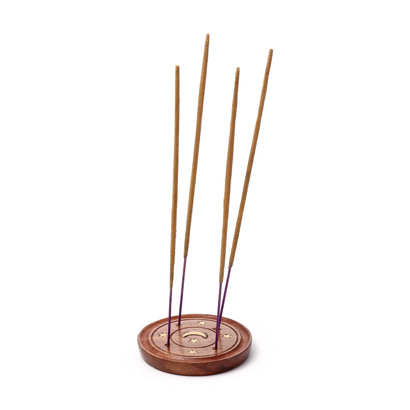 Incense stick holder with incense sticks on a white background