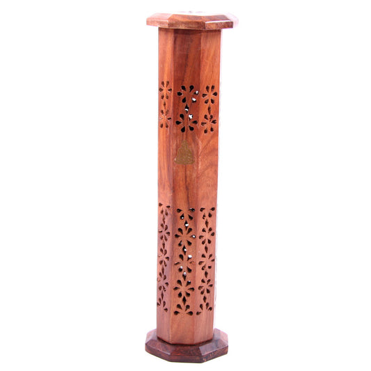 Wooden incense burner with floral patterns on a white background