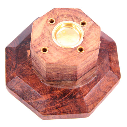 Wooden hexagonal object with a central gold-colored component on a white background