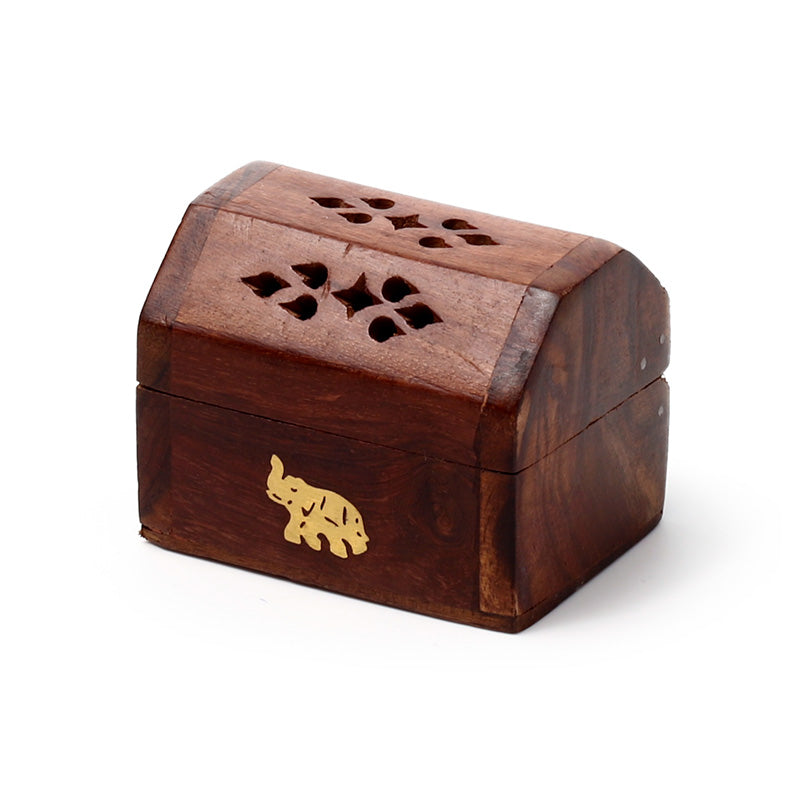 Wooden box with decorative cutouts and an elephant emblem on a white background