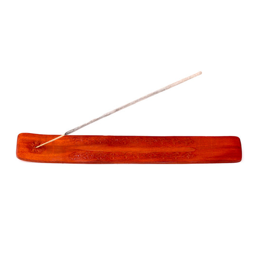 Red incense stick holder on a white background
