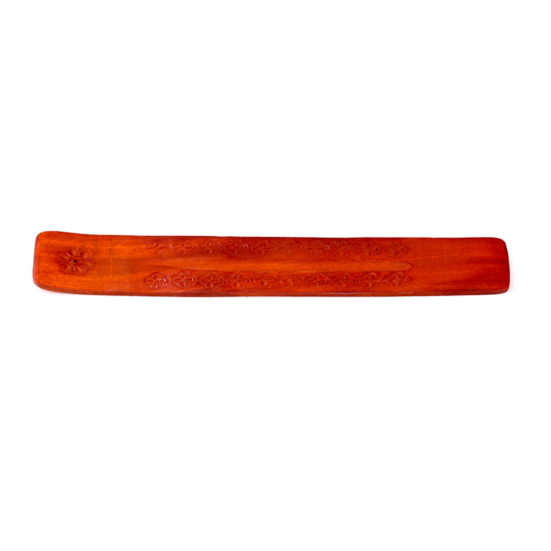 Red incense stick holder on a white background