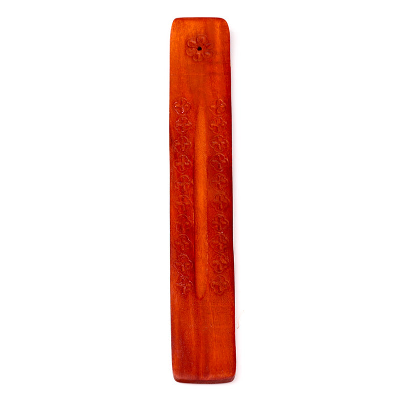Wooden incense stick holder with engraved text on a white background