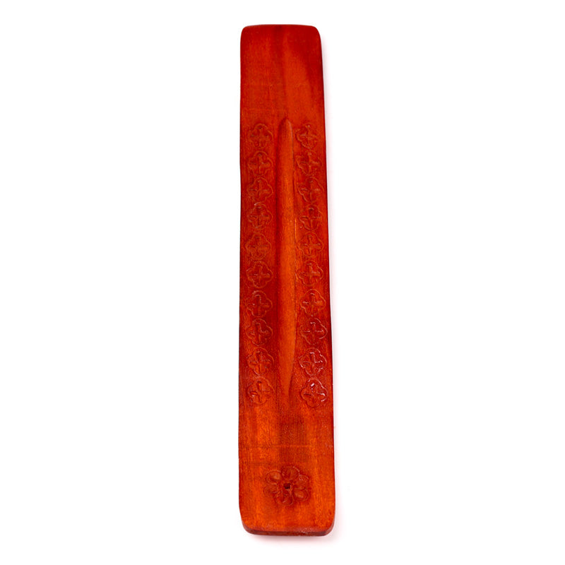 Red incense stick holder on a white background