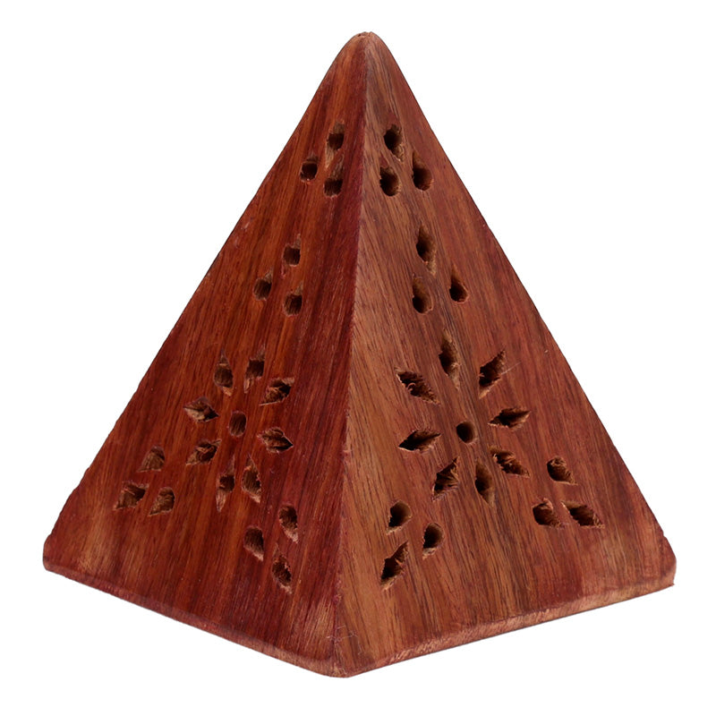 Triangular wooden incense burner with intricate holes on a white background