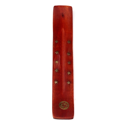 Wooden incense holder with star-shaped holes on a white background