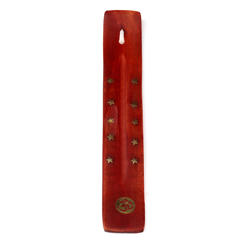 Wooden incense stick holder with star-shaped holes on a white background