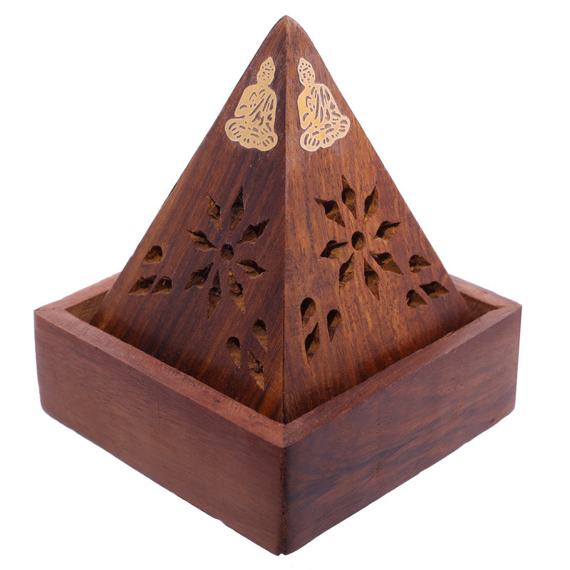 Wooden pyramid incense burner with decorative cutouts on a white background