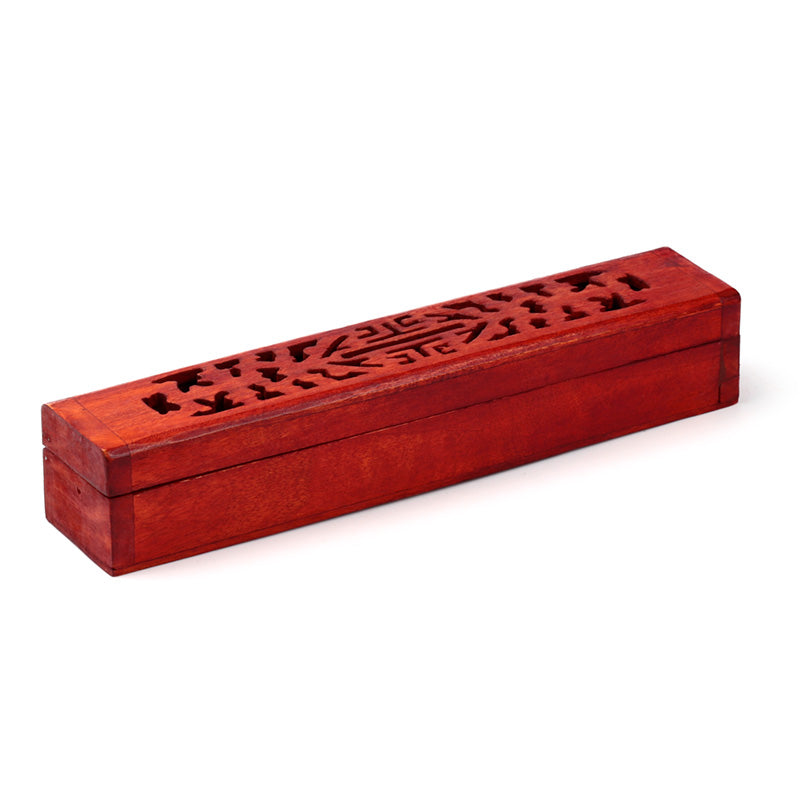 Red wooden incense box with intricate carvings on a white background