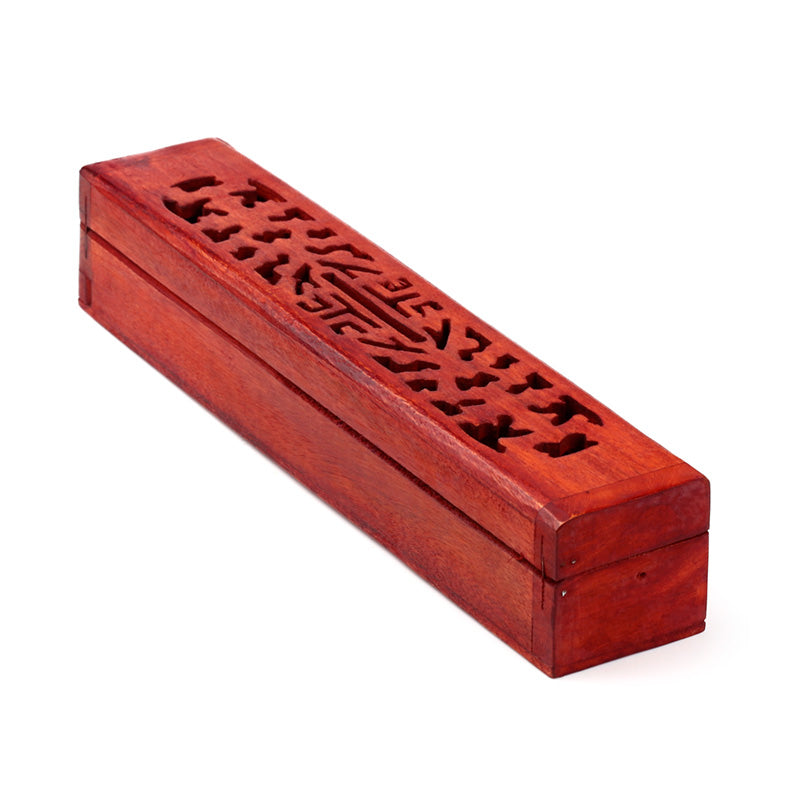 Wooden incense box with intricate carvings on a white background