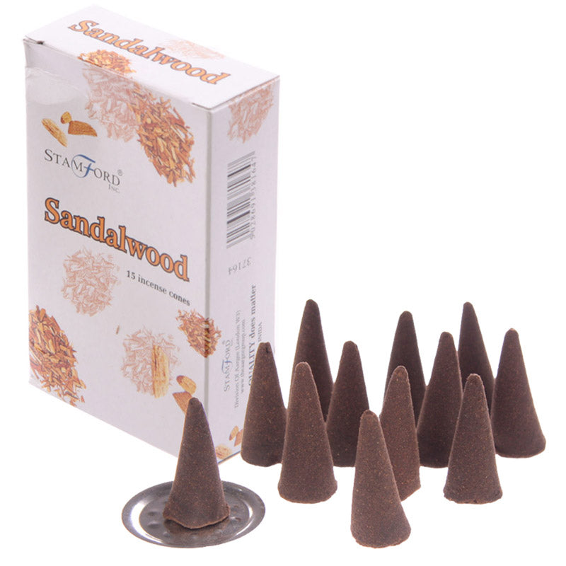 Incense cones next to the box on a white background