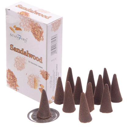 Incense cones next to the box on a white background