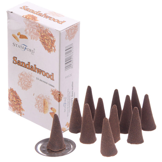 Incense cones next to the box on a white background