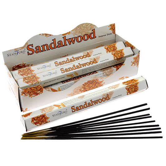 Incense sticks with their packaging on a white background