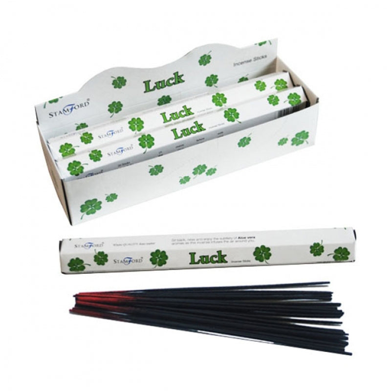 Incense sticks with 'Luck' packaging on a white background
