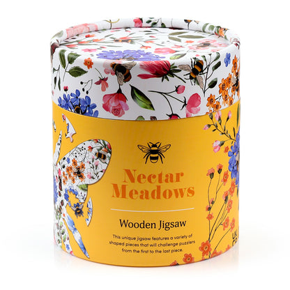 Floral-patterned cylindrical box with 'Nectar Meadows' branding on a white background