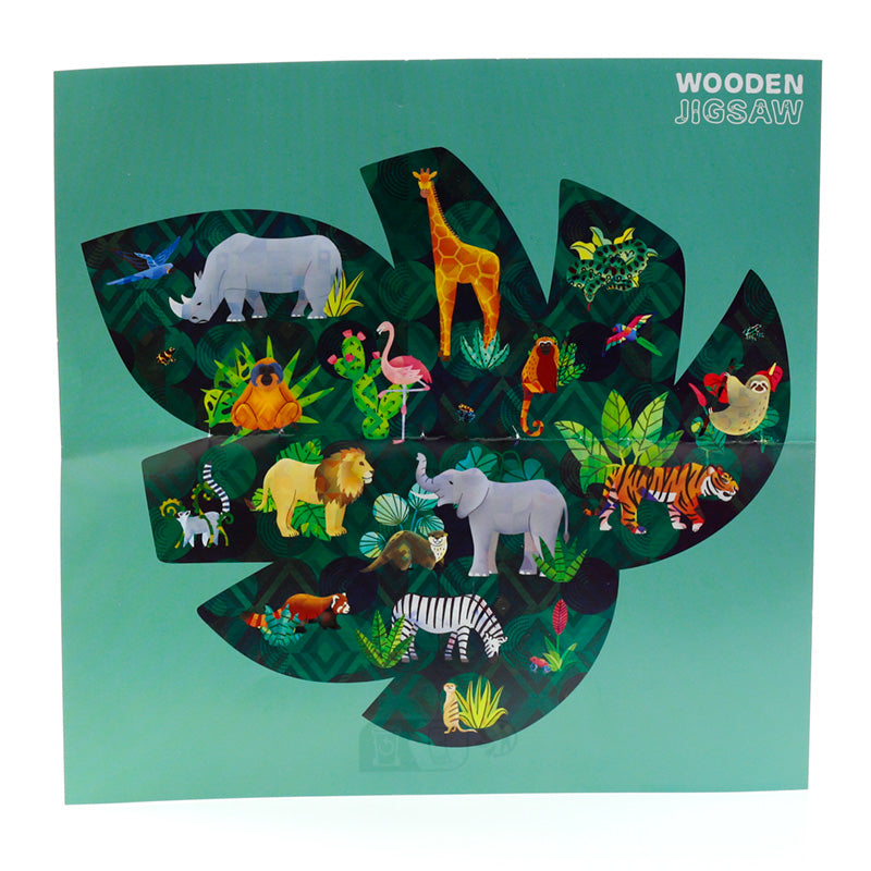 Wooden jigsaw with animal illustrations on a green background