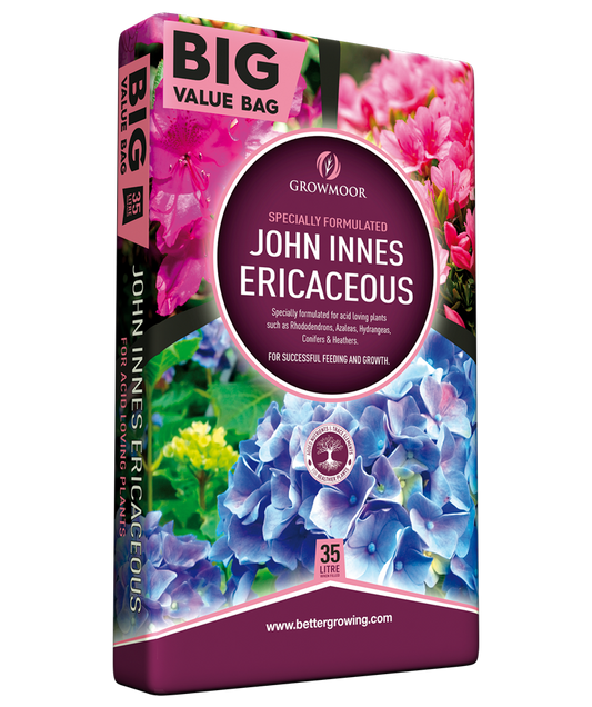 John Innes Ericaceous plant food packaging with colorful flowers on a white background