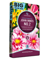 John Innes No. 2 plant food packaging with flowers on a white background