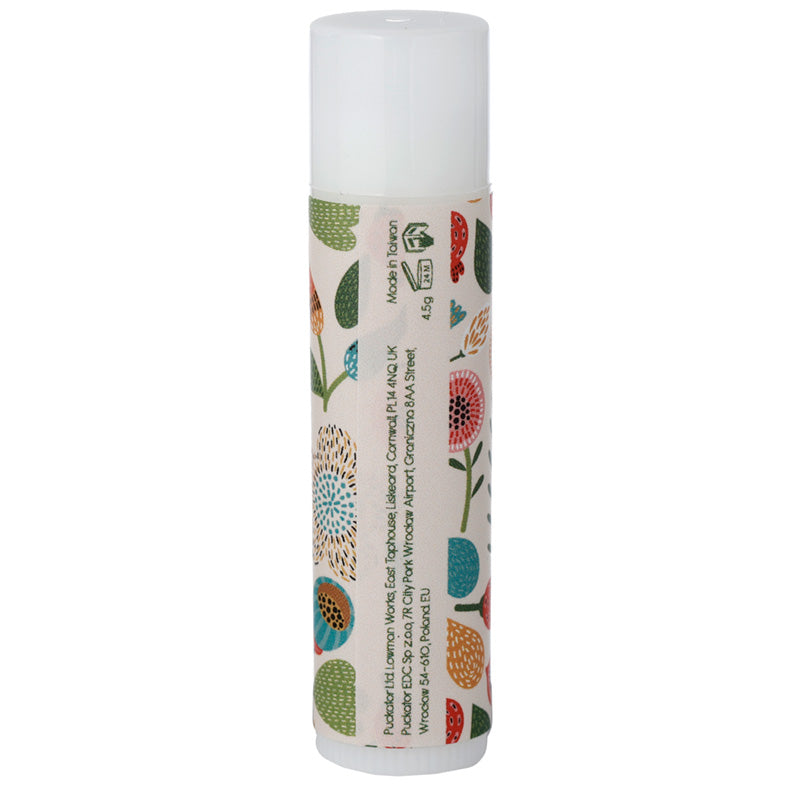 Lip balm with floral design on a white background