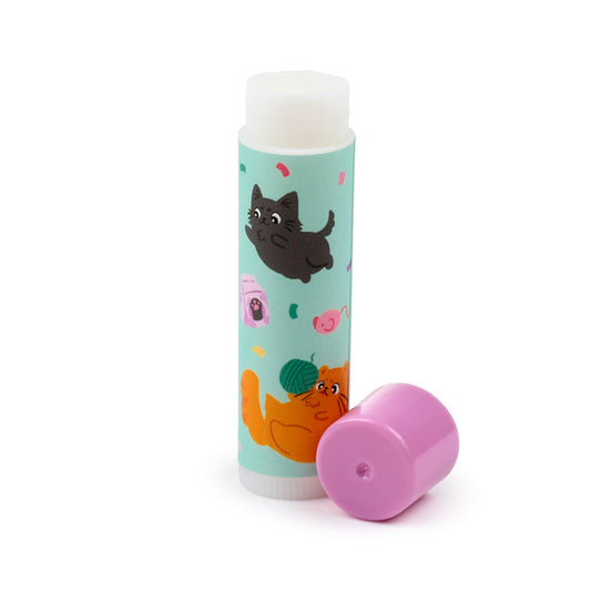 Lip balm with a colorful design of cats on a light blue background