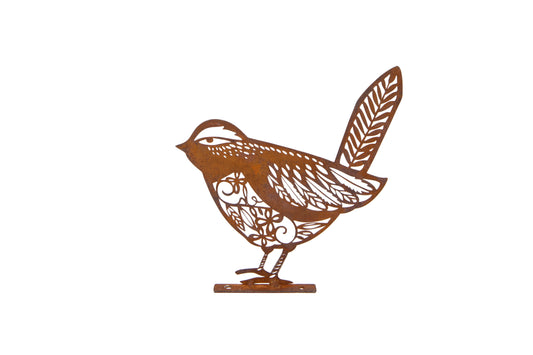 Decorative metal bird sculpture on a white background