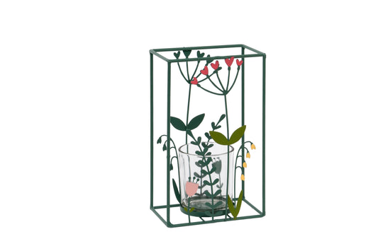 Decorative glass holder with floral design on a white background