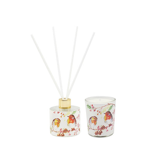Decorative diffuser and candle set with bird design on a white background