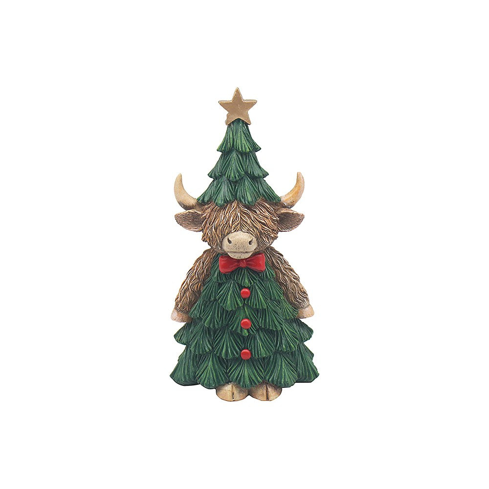 Statue of a highland cow with a Christmas tree on its back, wearing a red bow tie, on a white background.