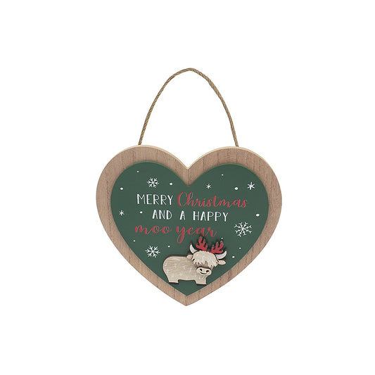 Heart-shaped Christmas decoration with a cow illustration and text on a white background