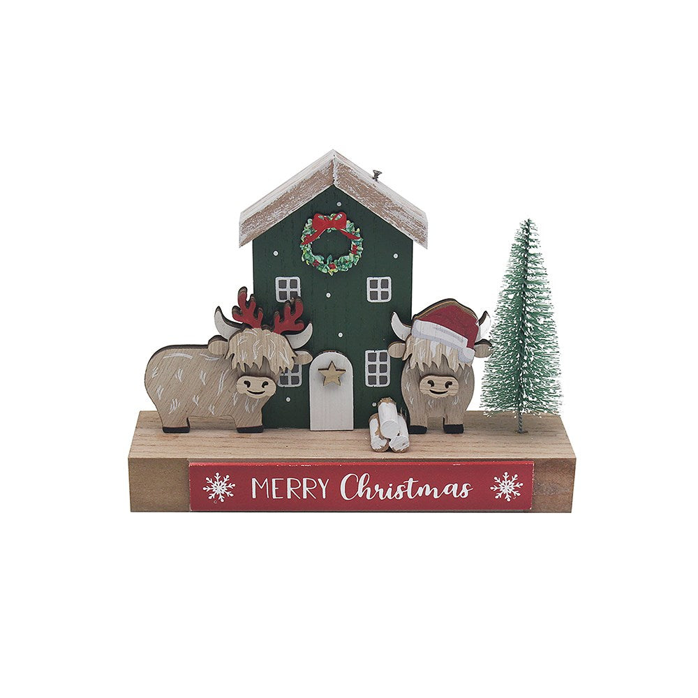 Christmas-themed decorative set with a house, animals, and tree on a white background