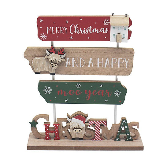 Decorative sign with Christmas-themed text and characters on a white background