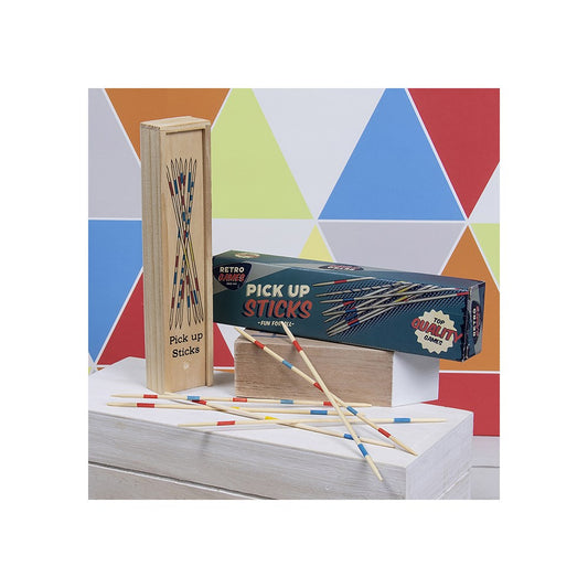Pick up sticks game with wooden sticks and packaging on a colorful geometric background
