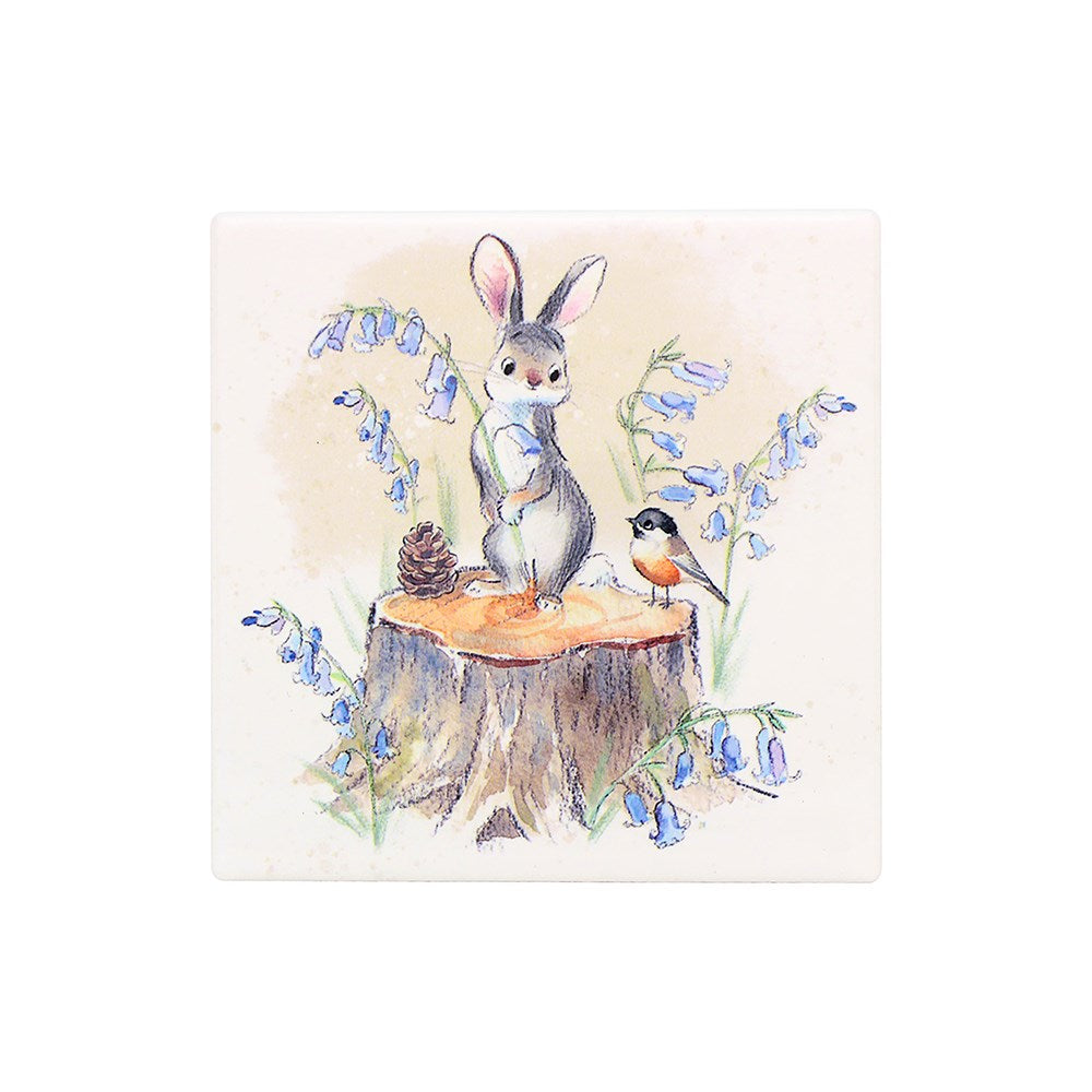 Illustration of a rabbit and bird on a tree stump with blue flowers