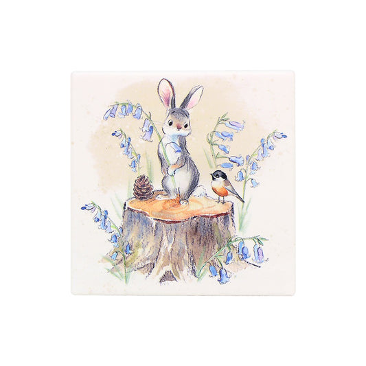 Illustration of a rabbit and bird on a tree stump with blue flowers